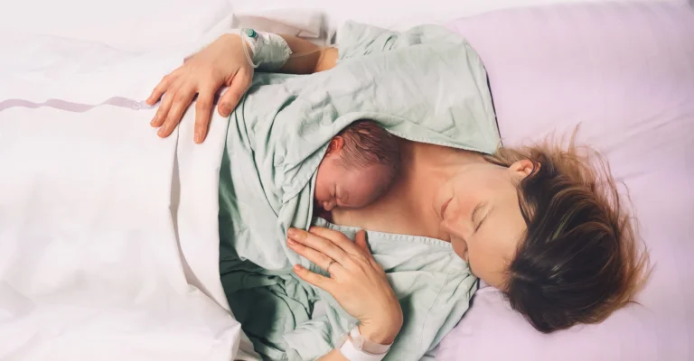 A mother and her newborn baby in hospital after birth